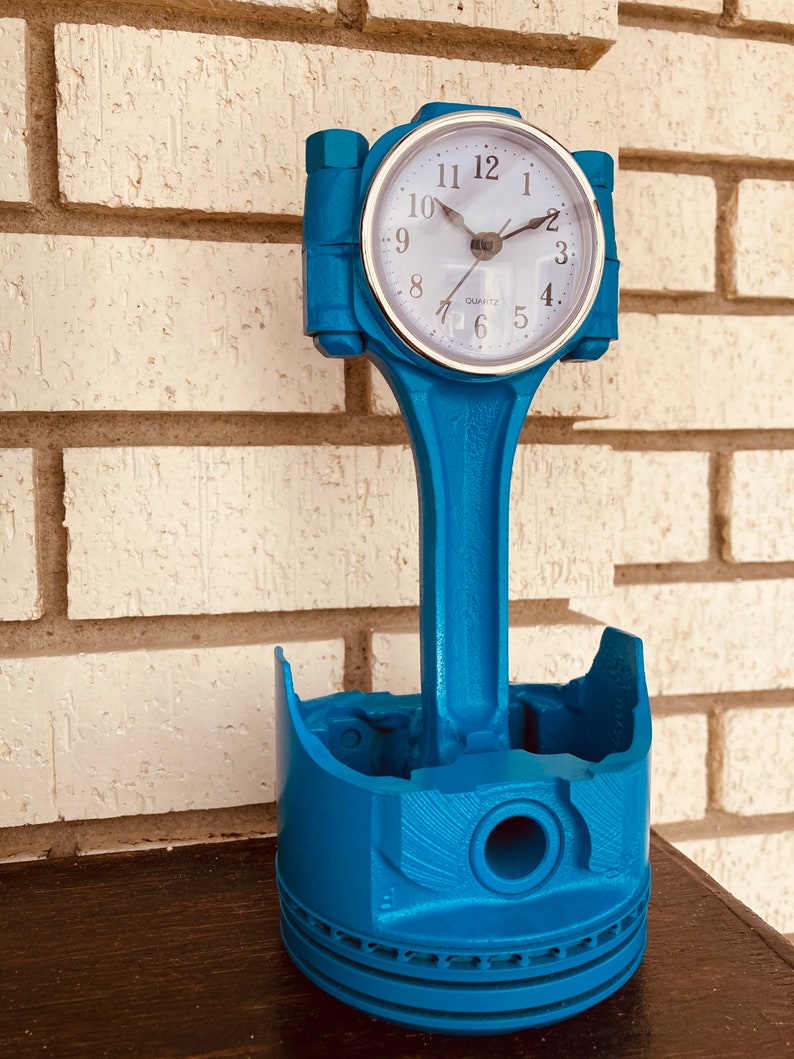 Piston Clock Grabber Blue