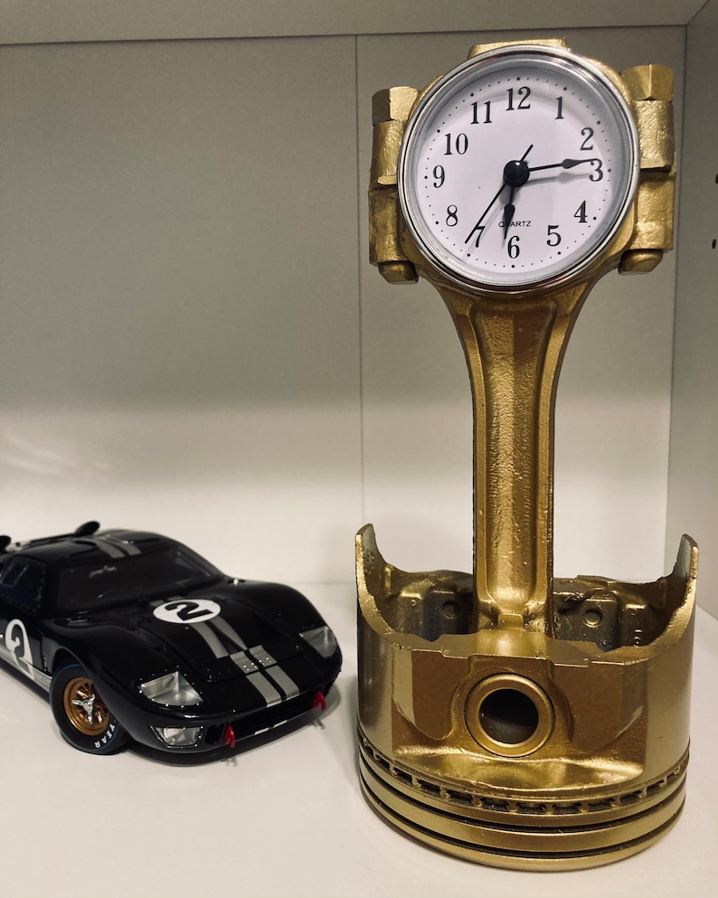 Piston Clock Gold