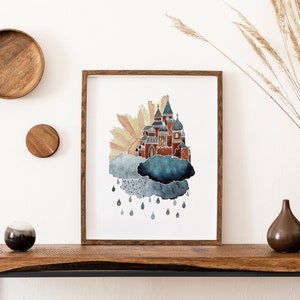 May include: A framed watercolor painting of a castle on a cloud with rain falling from the cloud. The castle is red and brown with blue and gold accents. The cloud is blue and gray with white highlights. The background is a white wall with a wooden shelf and a vase with dried flowers.