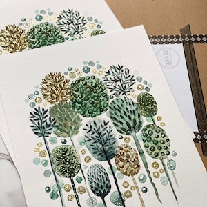 May include: Watercolor painting of a forest scene with green and gold trees. The trees are stylized and have a whimsical feel. The background is a light blue.