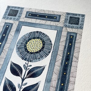 May include: A watercolor painting of a stylized flower with blue and gold accents. The flower is surrounded by a geometric pattern in shades of blue.