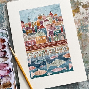 May include: Watercolor painting of a city skyline with colorful buildings and a river with fish swimming below. The buildings are in shades of red, orange, yellow, and brown. The river is a deep blue with white dots and the fish are in shades of pink, orange, and gray.