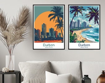 May include: Two framed illustrations of Durban, South Africa. The first image shows a cityscape with palm trees and a sunset. The second image shows a beach scene with palm trees, waves, and a cityscape in the background.