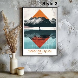 May include: A minimalist geometric print featuring a mountain range with a reflection in water. The print is in shades of blue, orange, and red. The text "Salar de Uyuni, Bolivia" is at the bottom of the print.