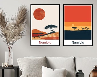 Könnte beinhalten: Zwei minimalistische Landschaftsdrucke mit einem Sonnenuntergang und einer roten Sonne am Himmel. Beide Drucke zeigen eine Silhouette eines Baumes und das Wort "Namibia" unten.