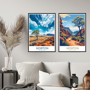May include: Two framed landscape prints of Morton National Park. The first print shows a blue sky with white clouds and a lone tree in a red dirt landscape. The second print shows a canyon with a winding path and a tree in the foreground. Both prints have the text "Morton National Park" at the bottom.