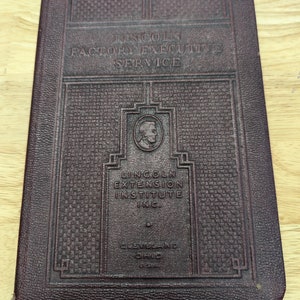 Lincoln factory executive service materials and supplies. 1949 vintage book embossed book cover Lincoln extension institute