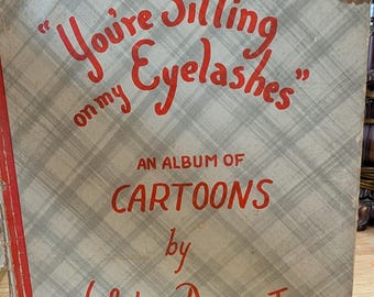 You're sitting on my eyelashes" an album of cartoons by Whitney Darrow Jr 1943