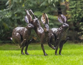 Hand Crafted Metal Triple Leaping Hares