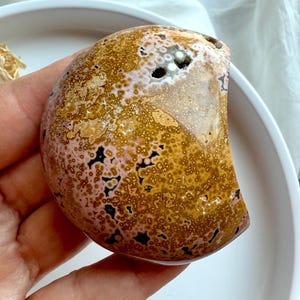 Peach and yellow Ocean Jasper moon stone showing detailed orbicular formations for grounding and emotional balance
