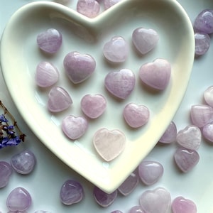 White heart bowl filled with Mini Pink Kunzite hearts — high-vibe crystals for love & heart chakra healing.
