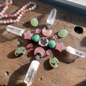 Clear Quartz Hexagon shown as the centerpiece in a crystal grid