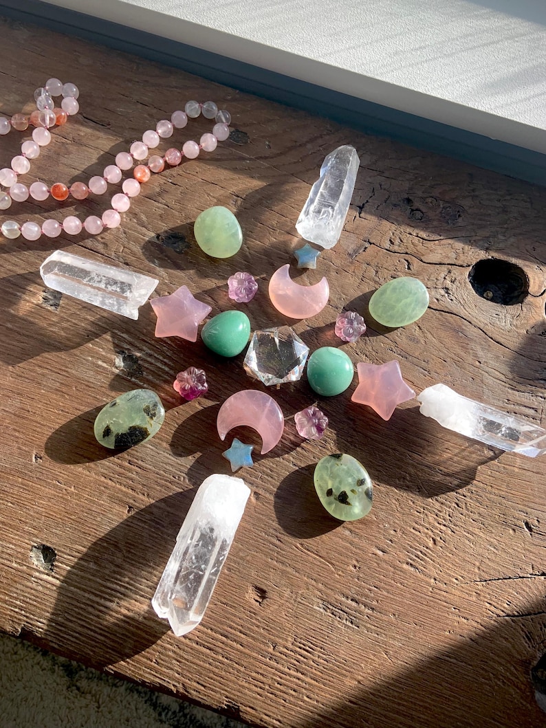 Clear Quartz Hexagon shown as the centerpiece in a crystal grid