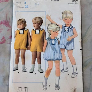 May include: Vintage Butterick sewing pattern 4812 featuring illustrations of children's clothing. The pattern includes designs for rompers and shorts. The cover is aged with visible wear and tear, and the size is 3.