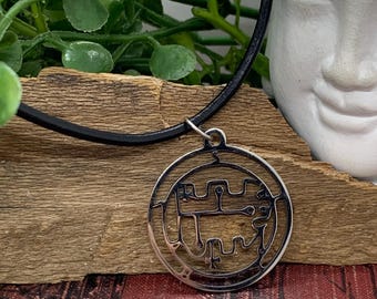 Stolas Pendant Necklace: Stainless Steel on Faux Leather Cord