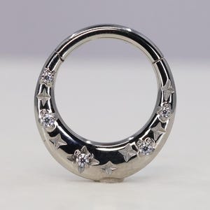 Titanium ASTM ASTM (cl26) Zirconia Star Clicker, hinged hoop 1.2mm (16ga) suitable for helix, conch, cartilage, tragus, lobe etc