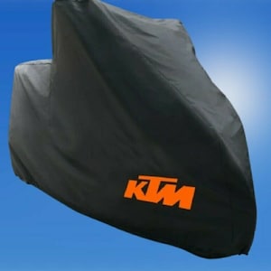 KTM Duke 390 dust cover. Black with orange logo