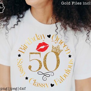 May include: A white t-shirt with a gold glitter circle design that says "Birthday Queen Sassy Classy Fabulous" with a red lip print and a gold crown. The number 50 is in the center of the circle.