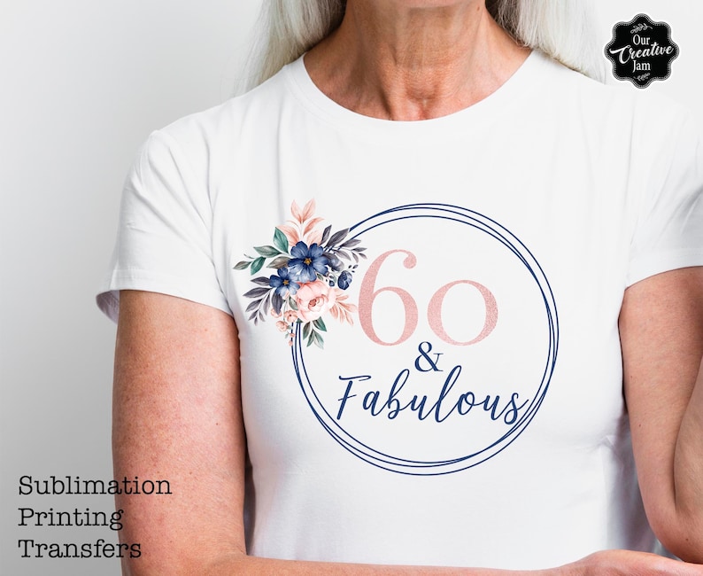 May include: White t-shirt with a navy blue and pink floral design and the text "60 & Fabulous" in a circle.