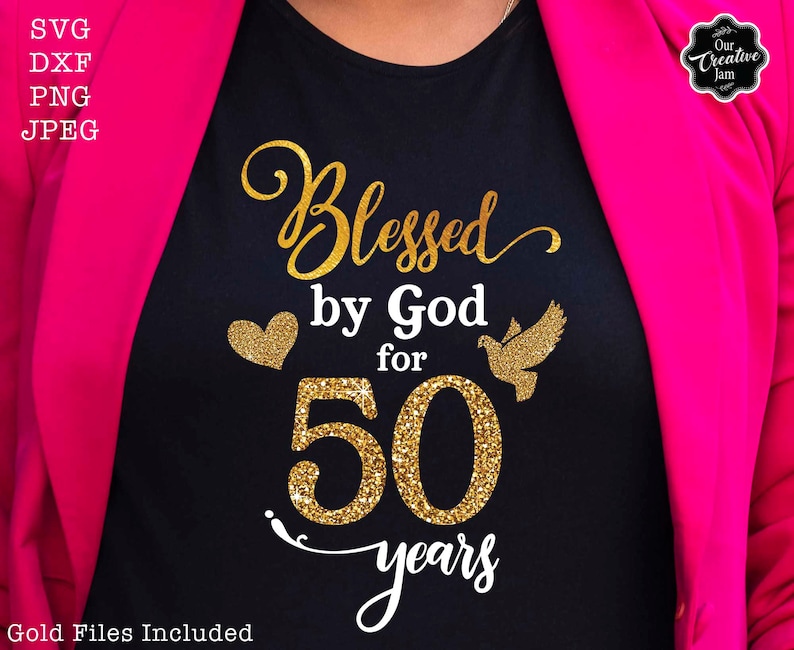 May include: A black t-shirt with gold glitter lettering that reads "Blessed by God for 50 years". A gold glitter heart and a gold glitter dove are on either side of the number 50.