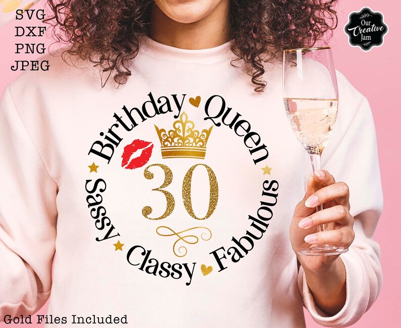 May include: A pink shirt with a black and gold design that says "Birthday Queen Sassy Classy Fabulous" with a gold crown and the number 30 in the center.