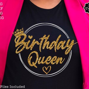 May include: A black t-shirt with a gold glitter design that says "Birthday Queen" in a circle with a crown and heart.