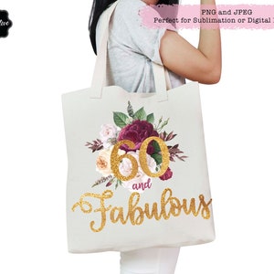 May include: A white tote bag with a floral design and gold glitter lettering that says "60 and fabulous".