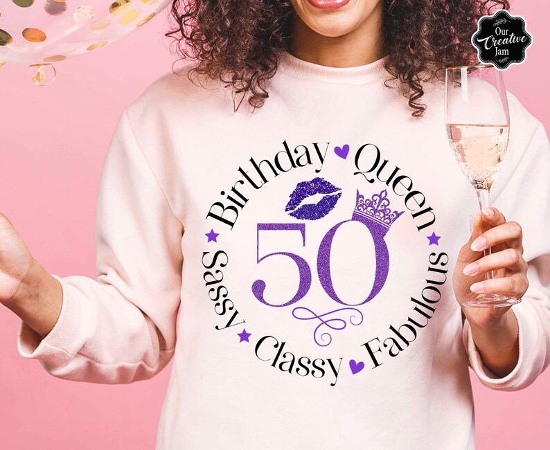 May include: A white sweatshirt with a purple glitter design that says "Sassy Birthday Queen 50 Classy Fabulous" with a crown, a heart, and a purple glitter lip print.