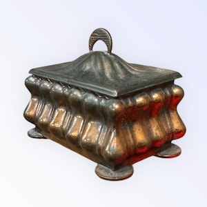 small copper color metal trinket box