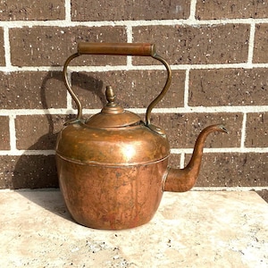 Old heavy copper tea pot,