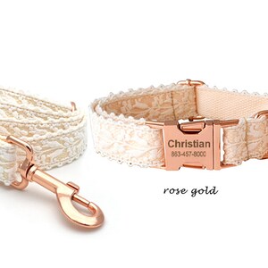 May include: White lace dog collar and lead set with rose gold hardware. The collar has a personalised name tag that reads "Christian 863-457-8000".