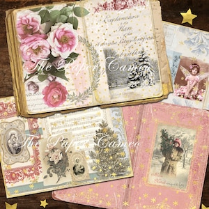 May include: A vintage scrapbook with pink and gold pages decorated with flowers, music notes, and Christmas scenes. The pages feature images of angels, a Christmas tree, and a woman holding a Christmas tree. The text on the pages includes "Explanation is the Plan of the", "elthrytas Citys Fortifica", "Gibralta", "Merry Christmas", and "Buon Natale a tutti voi".