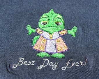 Camiseta, moletom ou blusa de moletom com capuz bordada com o Pascal de Enrolados da Disney