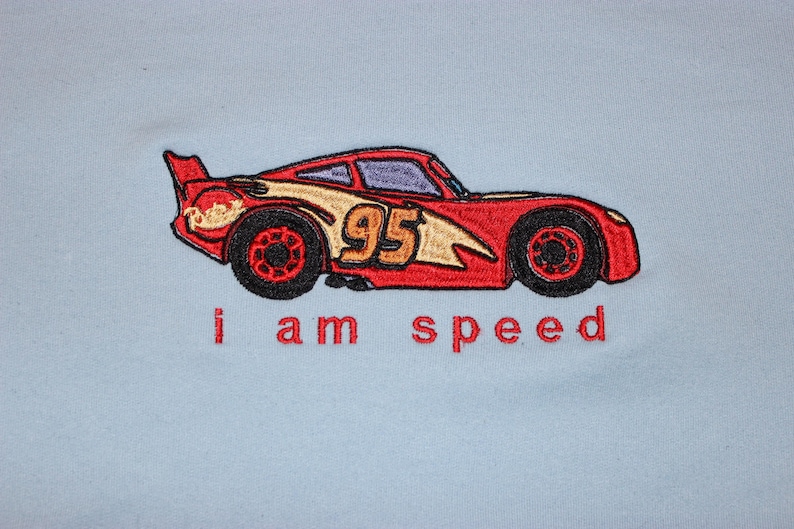 Lightning McQueen Embroidered Shirt | Disney Cars Sweatshirt or Hoodie | “I Am Speed” Racing Fan Gift | Kachow Apparel Light Blue