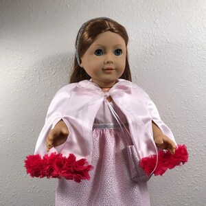 Doll Outfit: 4 pc. Pink Satin evening gown, cape, purse, and headband. Fits 18&quot; AG type doll.