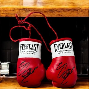 Balboa (The Greatest Autographed Mini Boxing Gloves (highly collectible)
