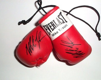 Mike Tyson Autographed Mini Boxing Gloves  (highly collectible)