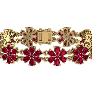 May include: A gold bracelet with a floral design, set with red gemstones. The bracelet is made up of flower-shaped links, connected by smaller links. The clasp is rectangular and gold. The gemstones are a deep red colour.