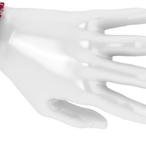 May include: A silver bracelet with a floral design. The bracelet features a series of red flower-shaped gemstones set in a silver band. The bracelet is displayed on a white mannequin hand.
