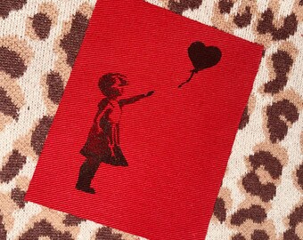 Parche de chica con globo de Banksy