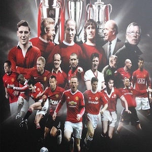 May include: A collage of Manchester United football players, past and present, wearing red and white jerseys. The players are arranged in front of a backdrop of trophies, including the European Cup and the FA Cup.