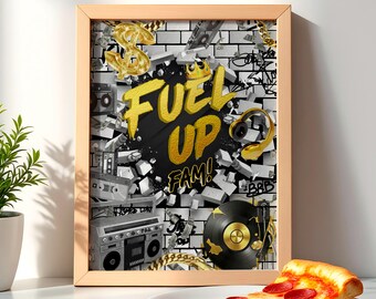 May include: A framed print with a black background and gold text that reads "Fuel Up Fam!" The background is a collage of images including a brick wall, a cassette tape, a boombox, a record, and headphones.