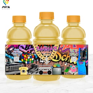 May include: Three yellow juice bottles with colorful labels featuring a 90s theme. The labels have a graffiti background with images of a boombox, a Rubik's cube, a phone, roller skates, a television, and a video game. The text on the labels reads "Sasha's Birthday Bash" and "Scan the code to listen to the song!"