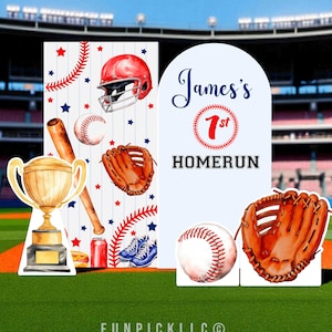 May include: Baseball-themed party decorations featuring a trophy, baseball bat, helmet, glove, baseballs, and the text "James's 1st Homerun." The backdrop includes red and blue stars and baseball stitching, set on a green field.