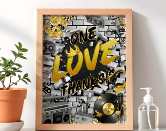 May include: A framed print with a black and white brick wall background. The words "One Love Thanks!" are written in gold letters with a crown and dollar sign symbols. The print features a retro cassette tape, a record player, and a boombox.