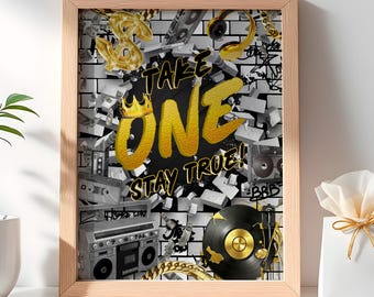 May include: A gold and black graphic print with the words "Take One Stay True!" on a broken brick wall background. The graphic includes a crown, a cassette tape, a record player, and a boombox.