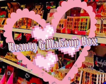 May include: A pink heart-shaped graphic with the text "Beauty & Makeup Box" over a shelf of colourful makeup palettes and other beauty products.