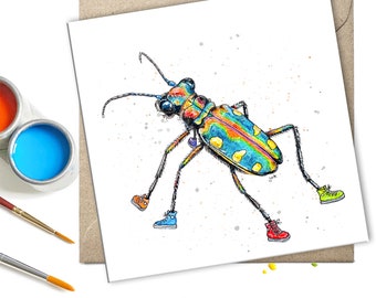 May include: A colorful cartoon illustration of a beetle wearing shoes. The beetle is blue, green, yellow, and orange. The shoes are red, orange, blue, and green.