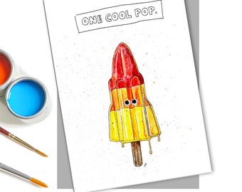 May include: A greeting card with a watercolor illustration of a red and yellow popsicle with googly eyes. The text "ONE COOL POP." is above the popsicle. Paint and brushes are in the background.