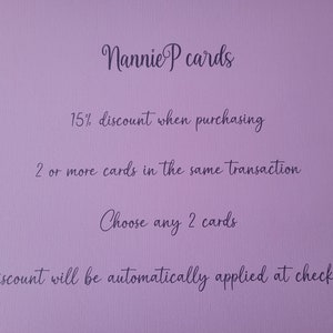 May include: A purple background with white text that reads "Nannie P cards". The text below reads "15% discount when purchasing 2 or more cards in the same transaction. Choose any 2 cards. Discount will be automatically applied at checkout."